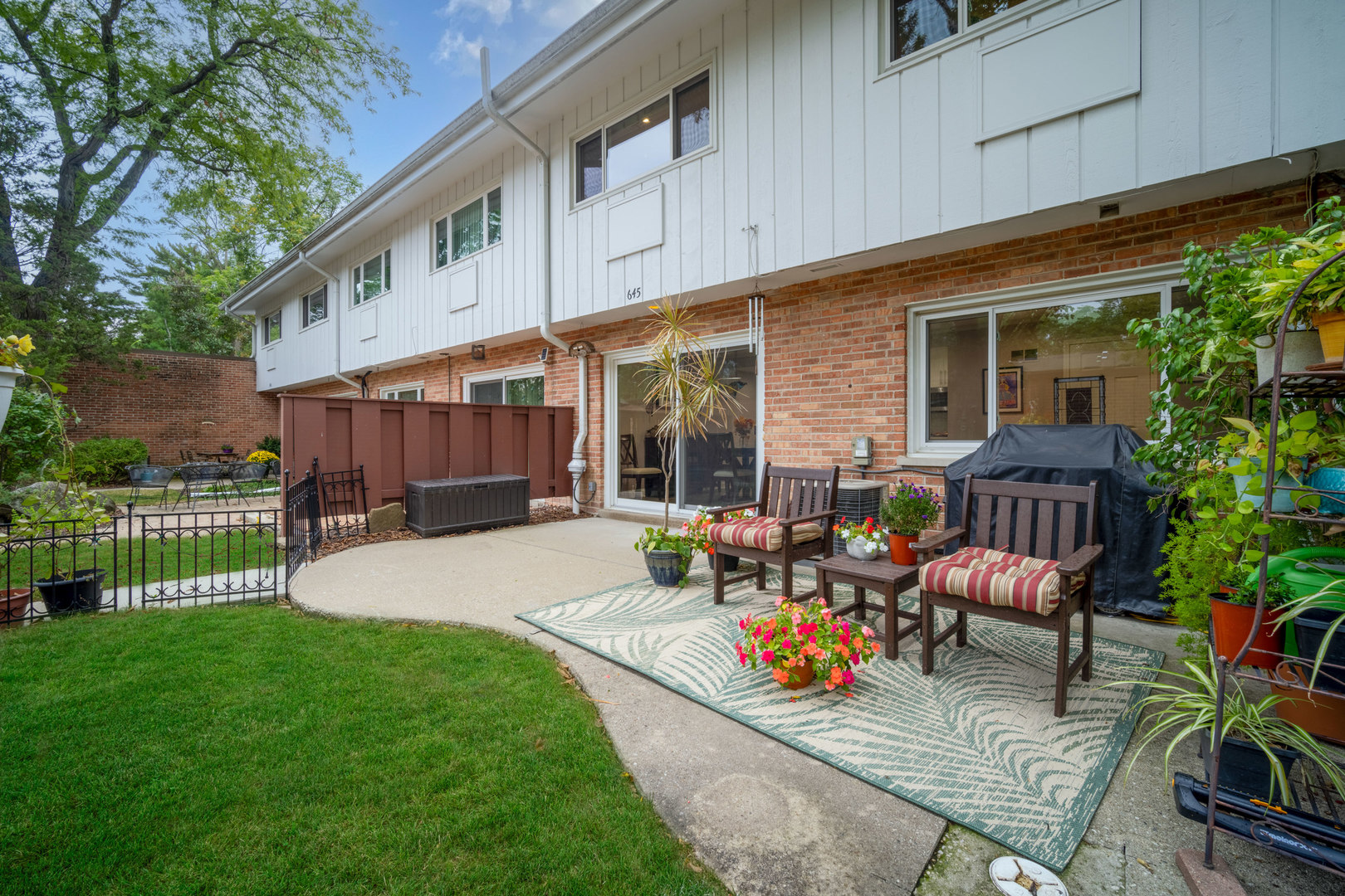 645 Spring Road Glenview, IL 60025 - Photo 29 of 31 a view of a house with backyard and sitting area