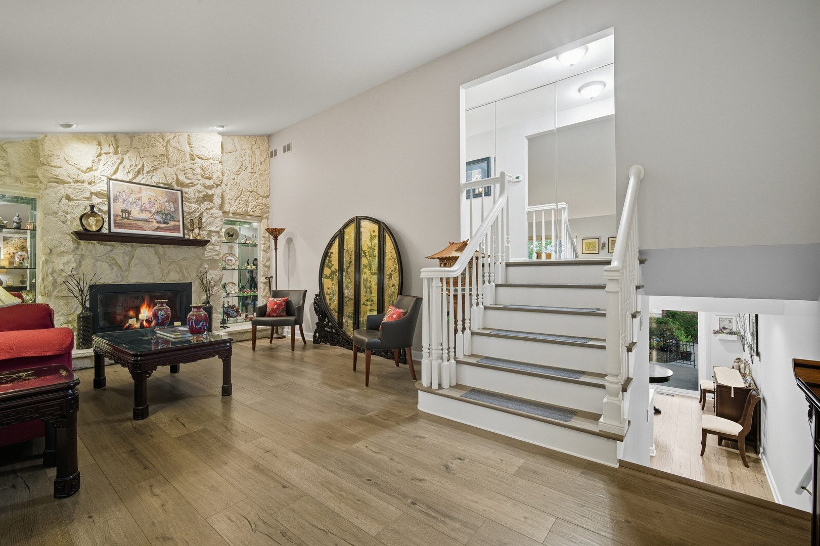 645 Spring Road Glenview, IL 60025 - Photo 3 of 31 a living room with furniture and a fireplace