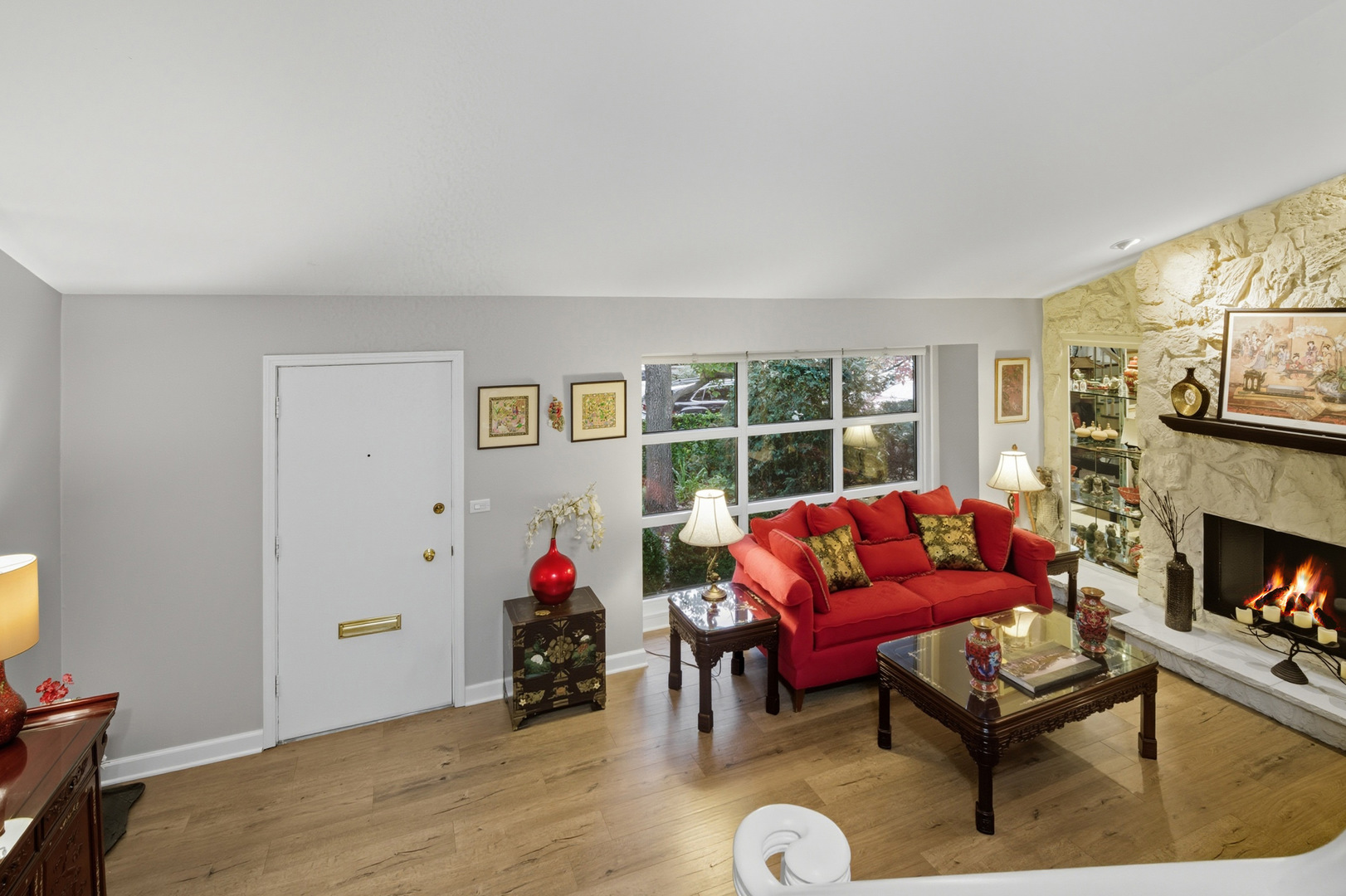 645 Spring Road Glenview, IL 60025 - Photo 6 of 31 a living room with furniture and a fireplace
