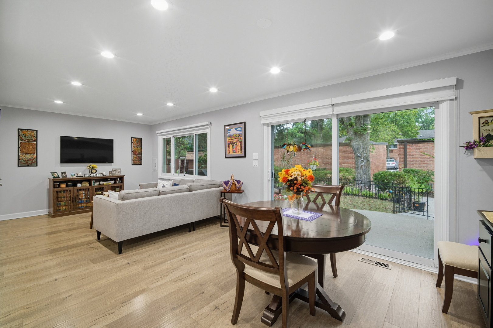 645 Spring Road Glenview, IL 60025 - Photo 8 of 31 a living room with furniture and a flat screen tv