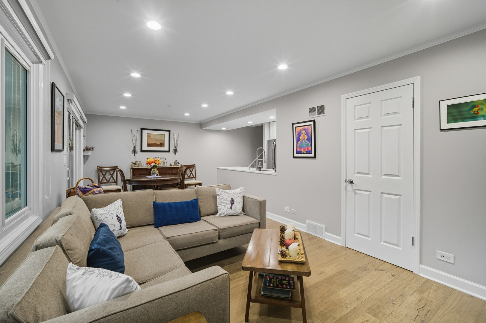 645 Spring Road Glenview, IL 60025 - Photo 9 of 31 a living room with furniture and a flat screen tv
