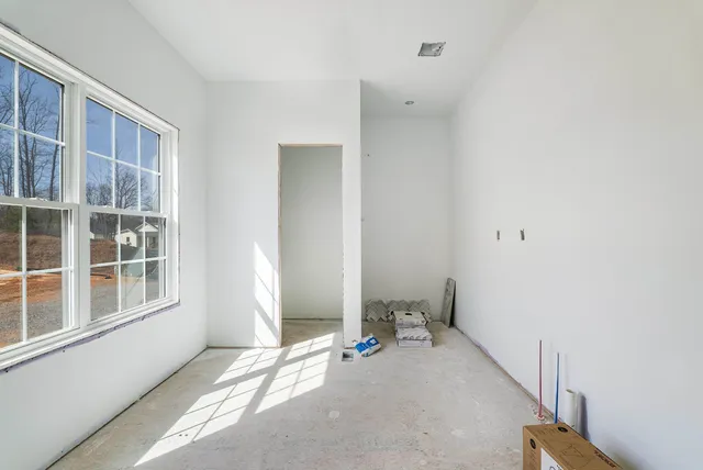 a view of a room with windows
