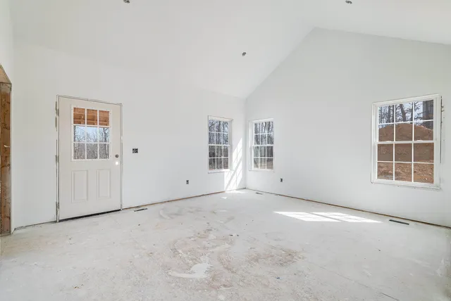 an empty room with windows