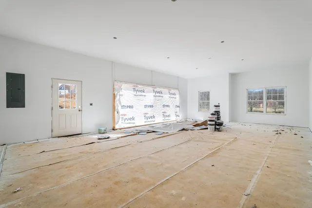 an empty room with windows