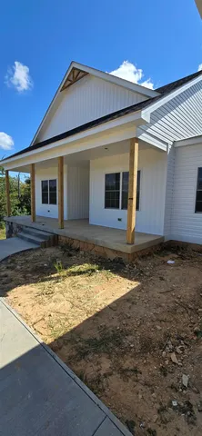 a view of house with pool