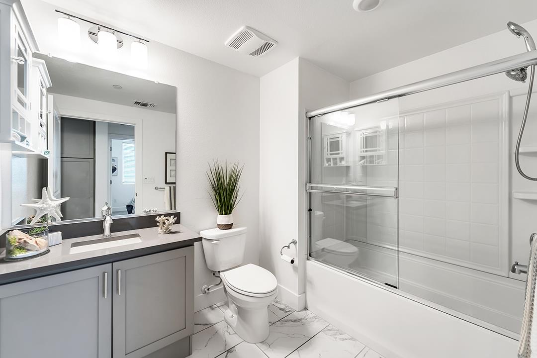 1421 Nightshade Road, Unit 30 Milpitas, CA 95035 - Photo 17 of 28 a bathroom with a sink a toilet and shower