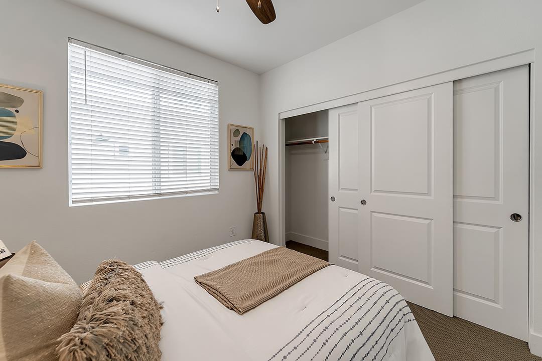 1421 Nightshade Road, Unit 30 Milpitas, CA 95035 - Photo 19 of 28 a bedroom with a bed and a window
