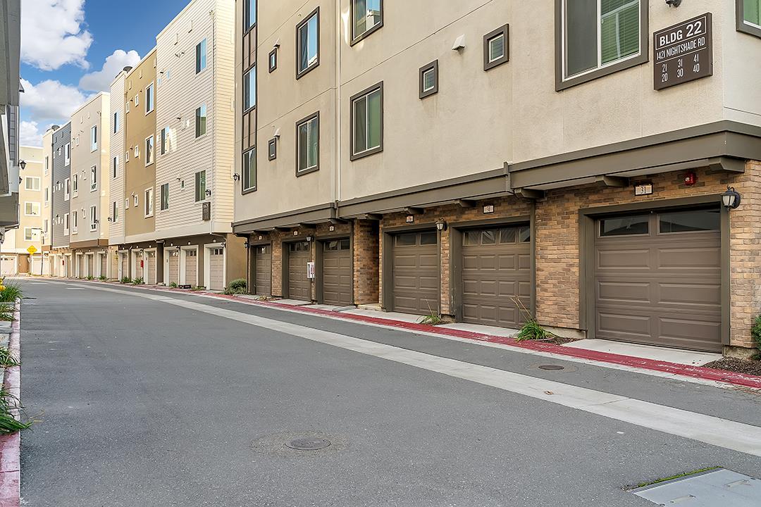 1421 Nightshade Road, Unit 30 Milpitas, CA 95035 - Photo 22 of 28 a front view of a building with garage