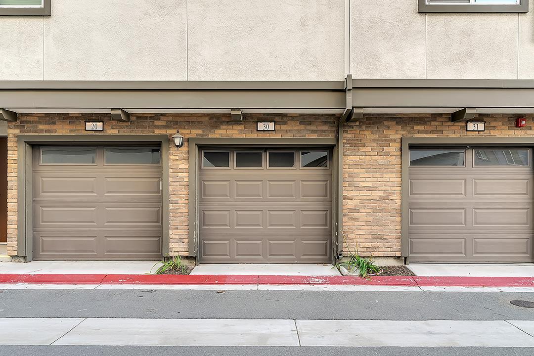 1421 Nightshade Road, Unit 30 Milpitas, CA 95035 - Photo 23 of 28 a front view of a house with a garage