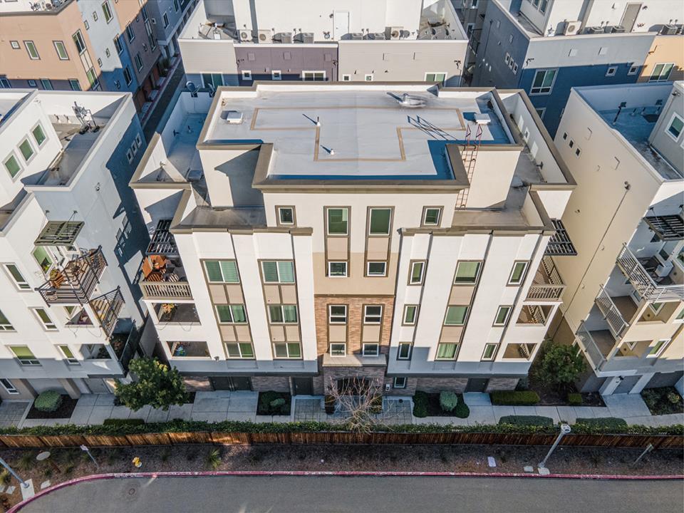 1421 Nightshade Road, Unit 30 Milpitas, CA 95035 - Photo 24 of 28 a front view of a building with windows