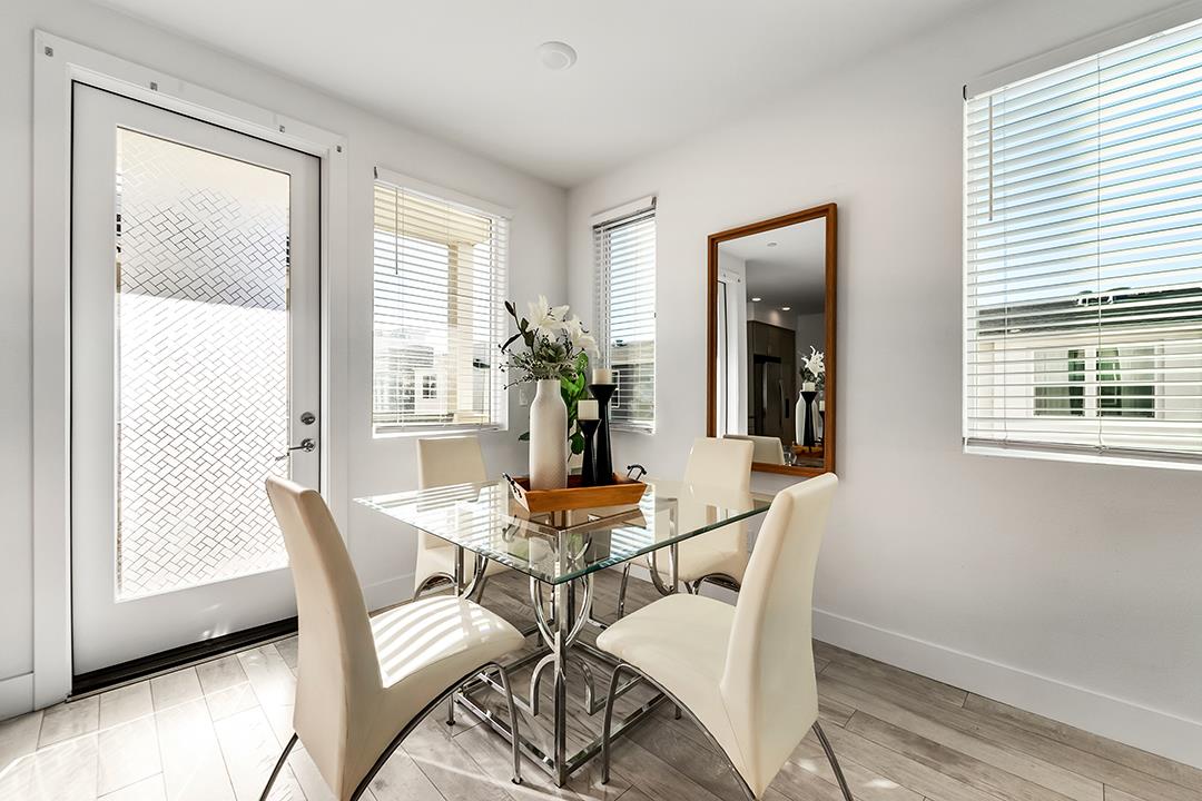 1421 Nightshade Road, Unit 30 Milpitas, CA 95035 - Photo 4 of 28 a dining room with furniture and window
