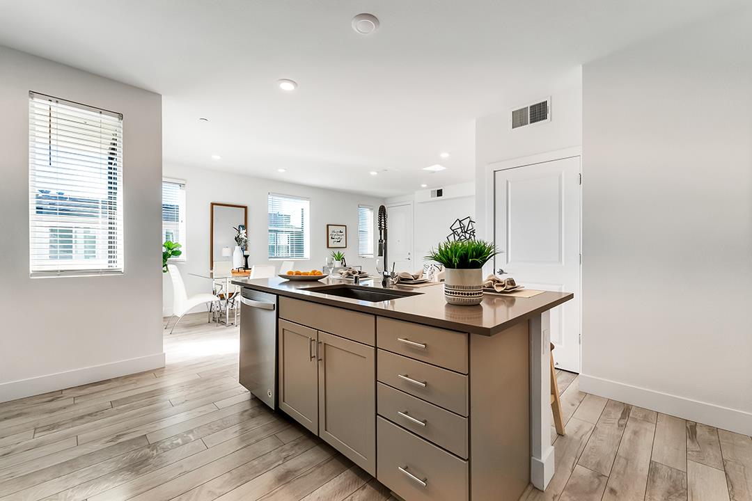 1421 Nightshade Road, Unit 30 Milpitas, CA 95035 - Photo 6 of 28 a kitchen with a sink and cabinets