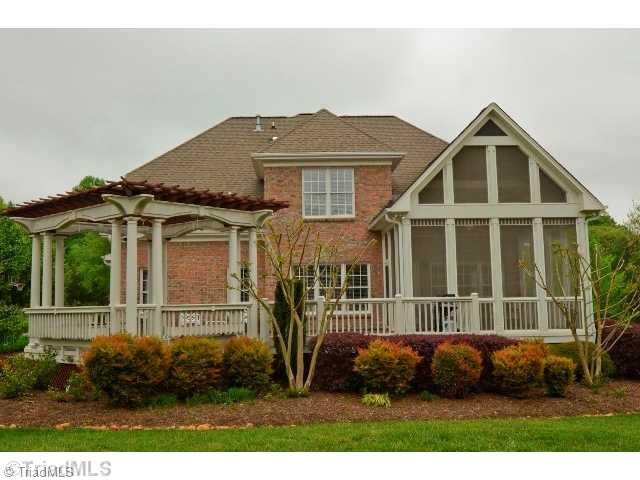 6009 Beckenham Way Oak Ridge, NC 27310 - Photo 2 of 16 Exterior Back.
