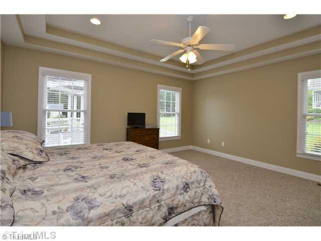 6009 Beckenham Way Oak Ridge, NC 27310 - Photo 9 of 16 Master Bedroom.