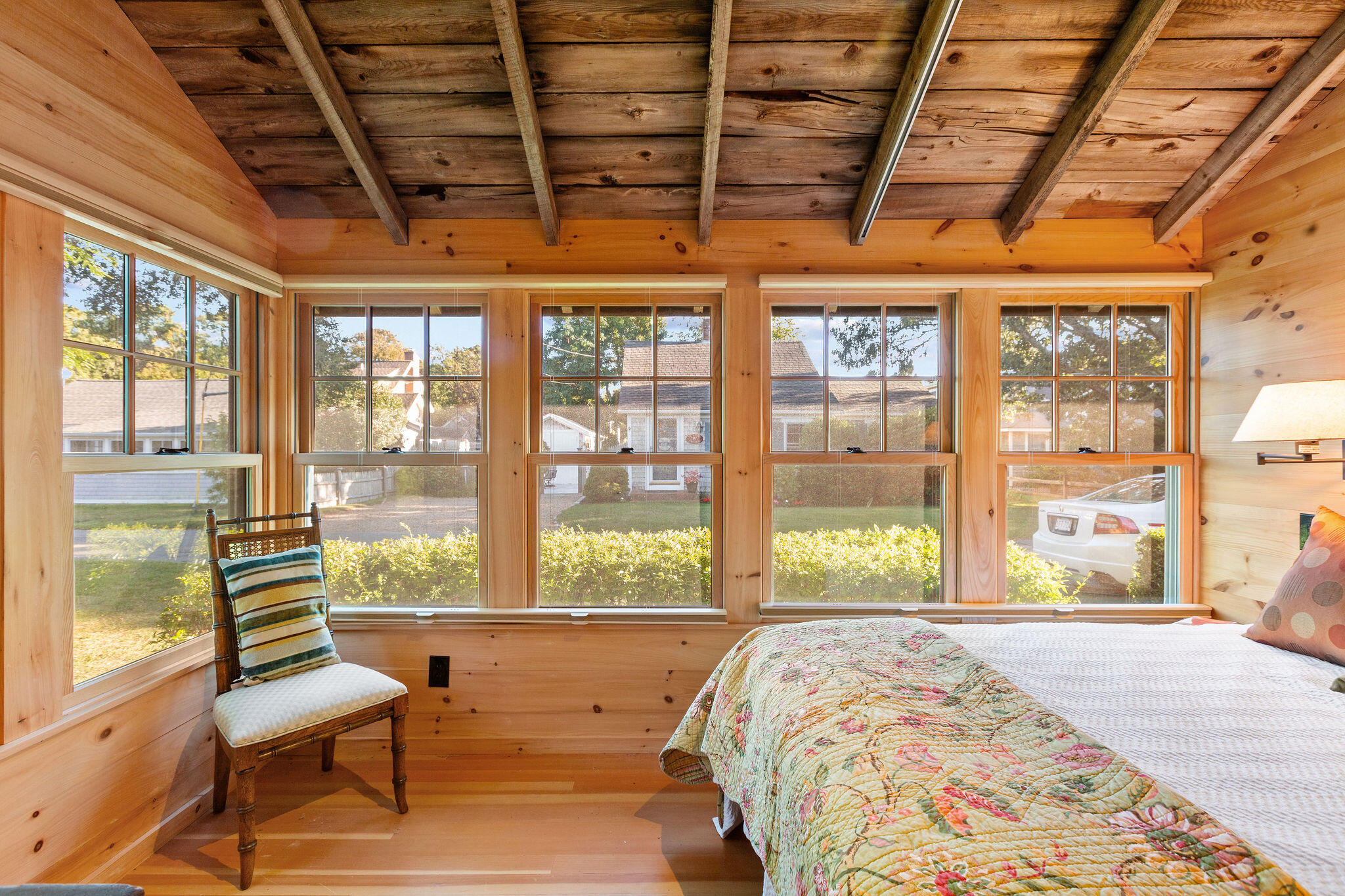 35 Bradford Road Brewster, MA 02631 - Photo 15 of 27 a bedroom with a large bed and a balcony