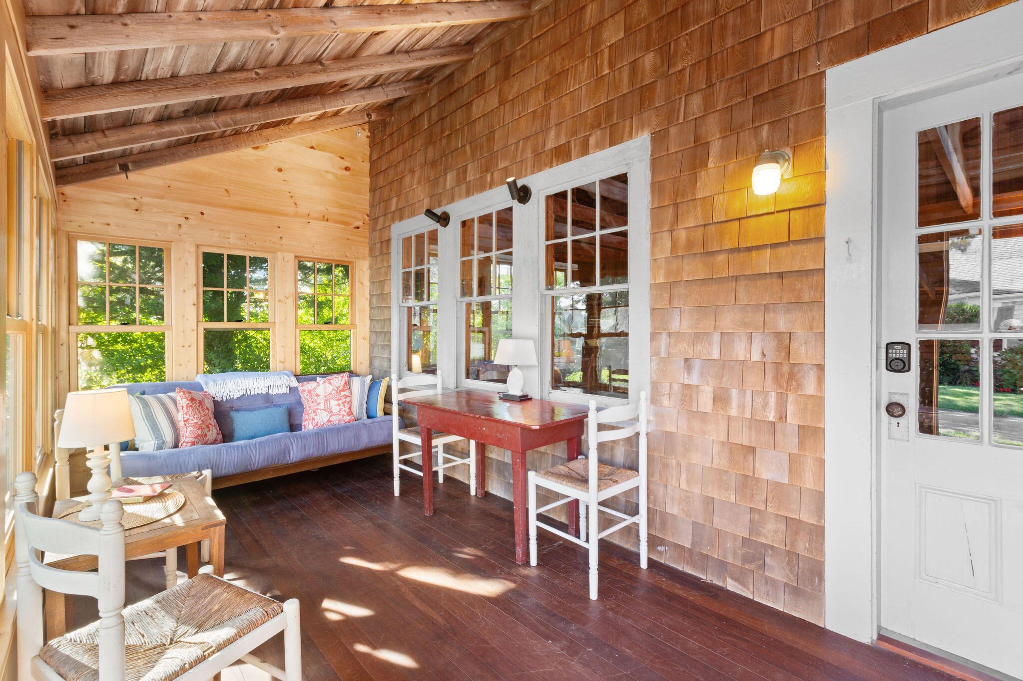 35 Bradford Road Brewster, MA 02631 - Photo 6 of 27 a living room with furniture and a floor to ceiling window