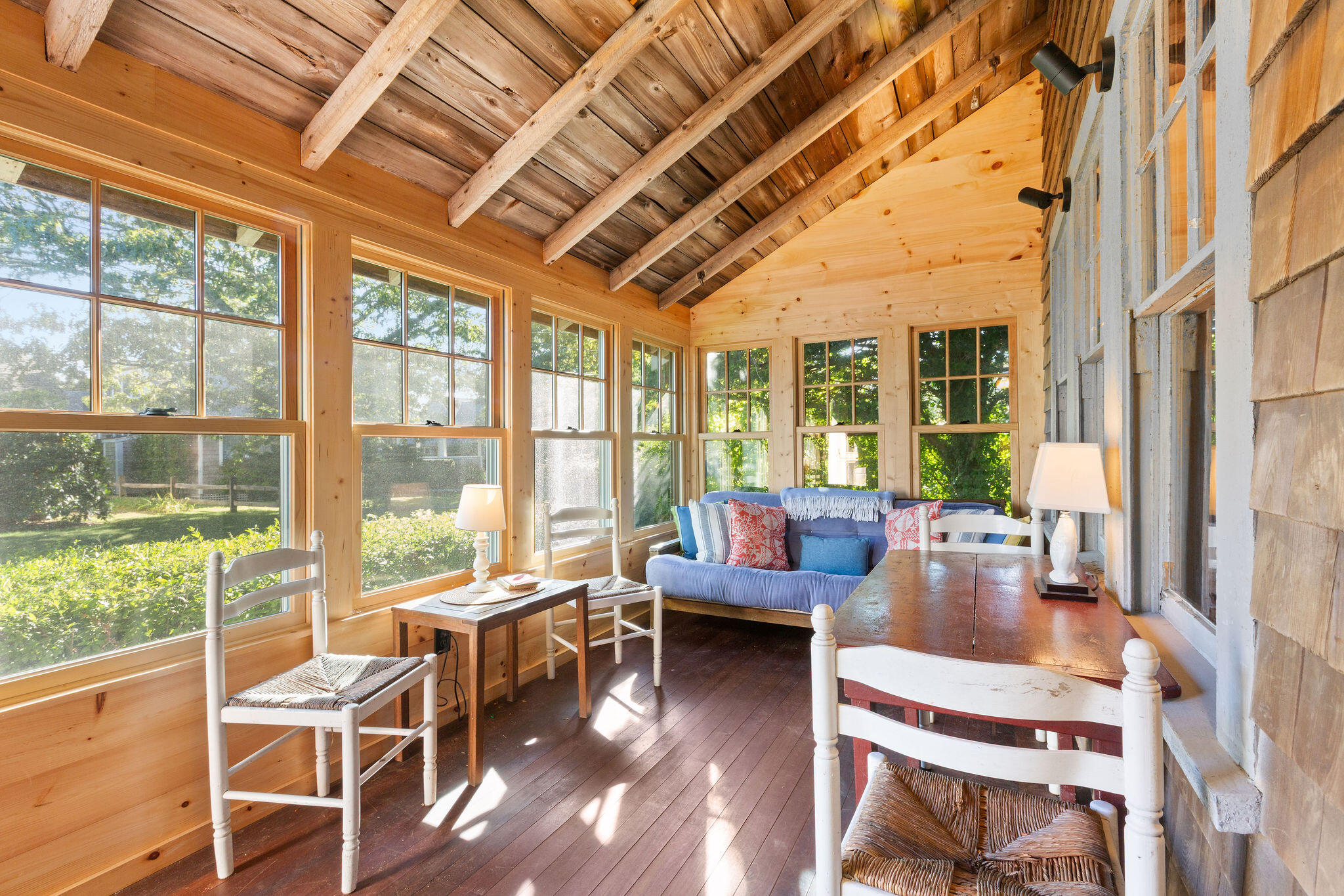 35 Bradford Road Brewster, MA 02631 - Photo 7 of 27 a living room with furniture and a large window