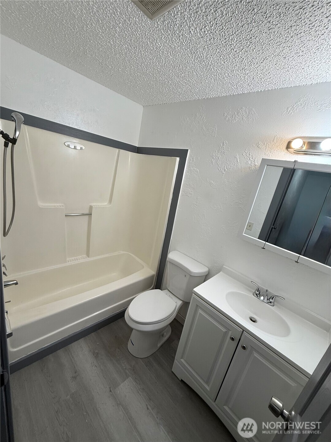 1007 MacFarlane Street Aberdeen, WA 98520 - Photo 10 of 23 a bathroom with a sink and a mirror