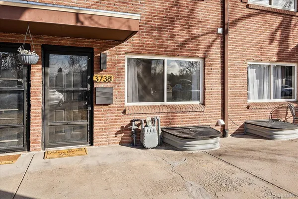 a front view of a house with parking