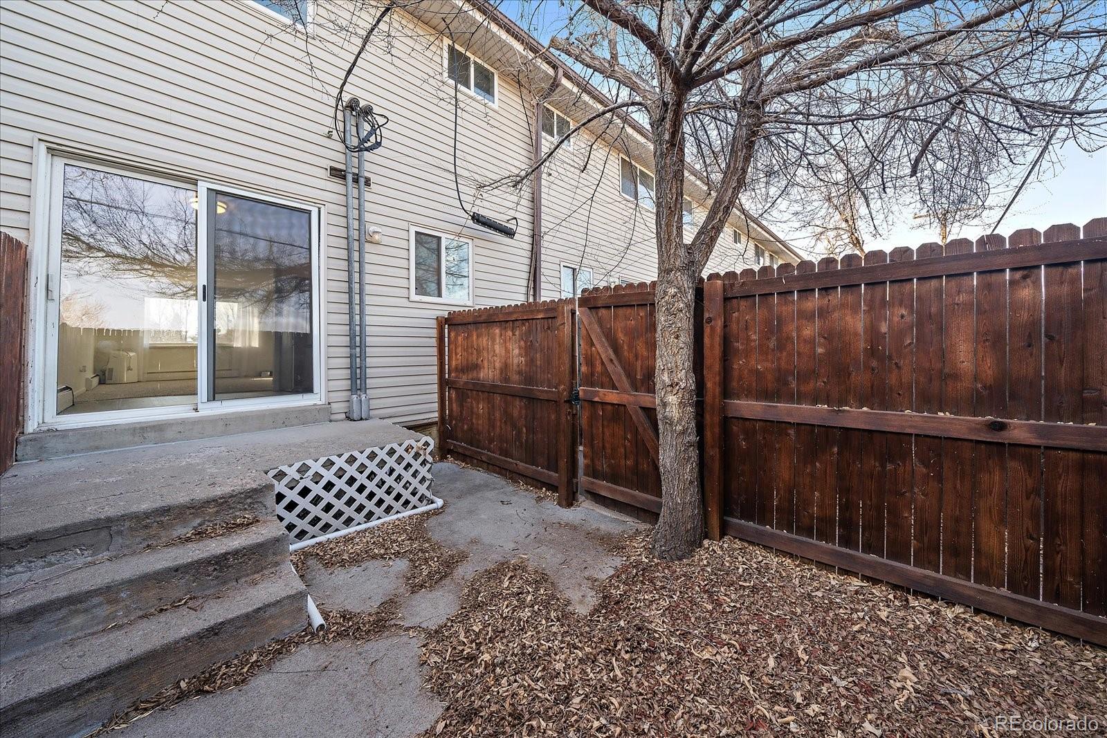 3738 Miller Court Wheat Ridge, CO 80033 - Photo 20 of 20 a view of a black and white wall with a large window