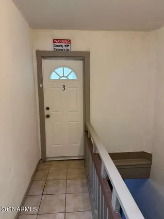 a hallway with storage and utility