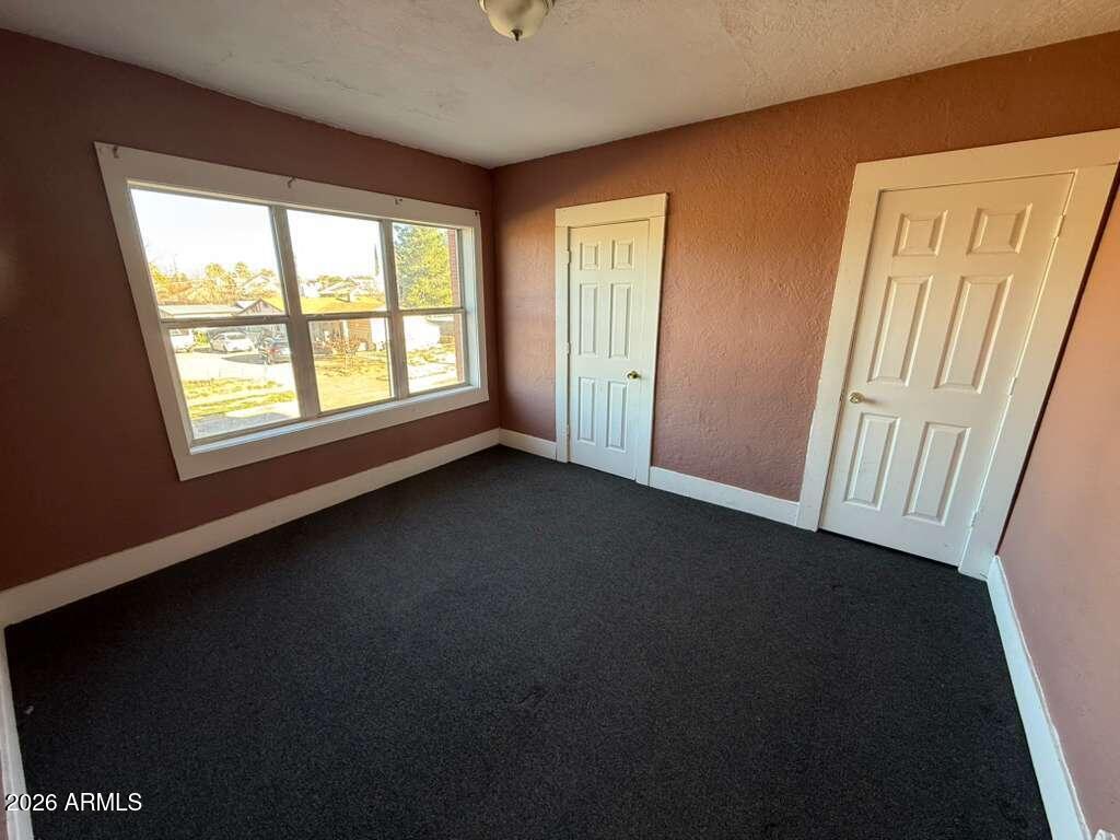 1165 East 10th Street, Unit 3 Douglas, AZ 85607 - Photo 11 of 22 a view of empty room with window