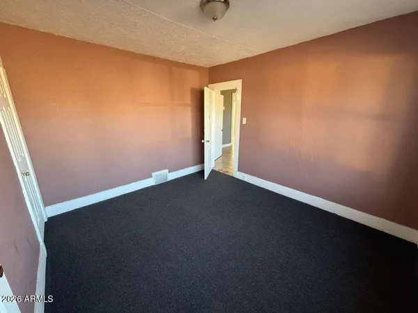 an empty room with a door