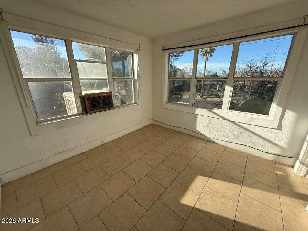 1165 East 10th Street, Unit 3 Douglas, AZ 85607 - Photo 20 of 22 a view of an empty room with a window
