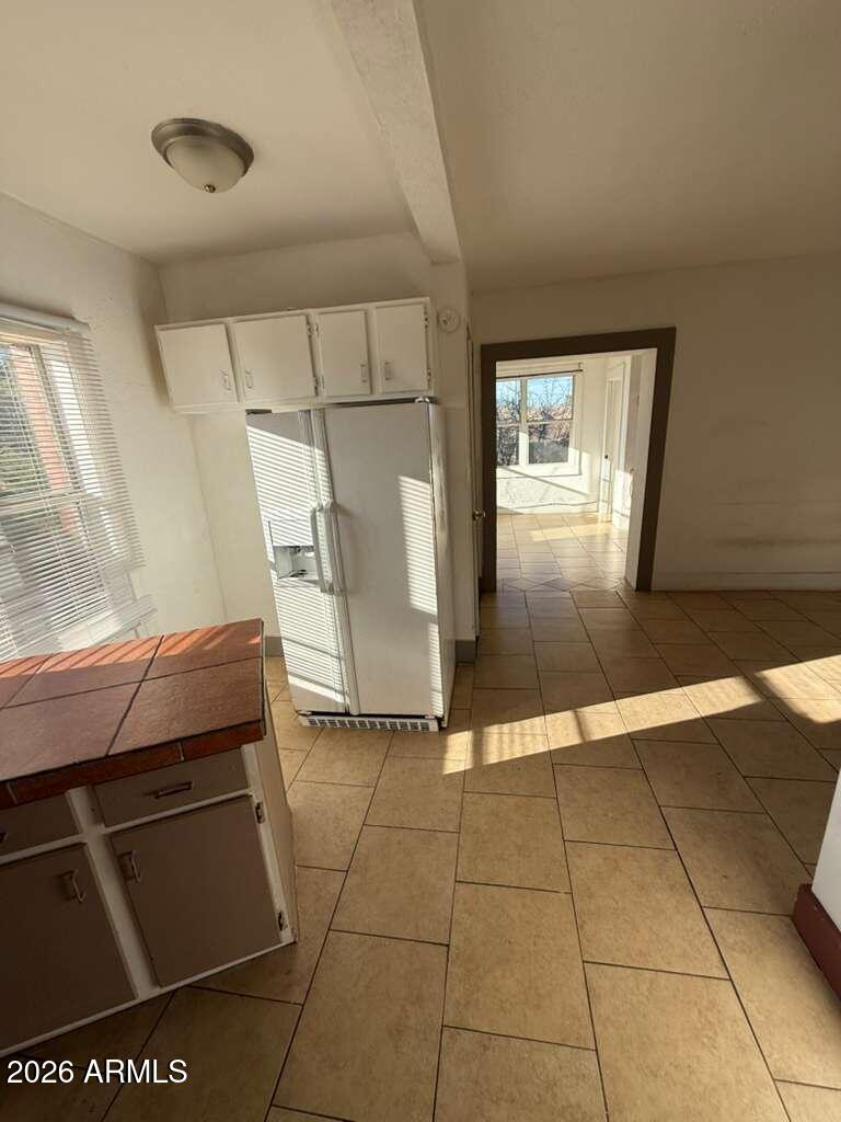 1165 East 10th Street, Unit 3 Douglas, AZ 85607 - Photo 2 of 22 a room with washing machine and window