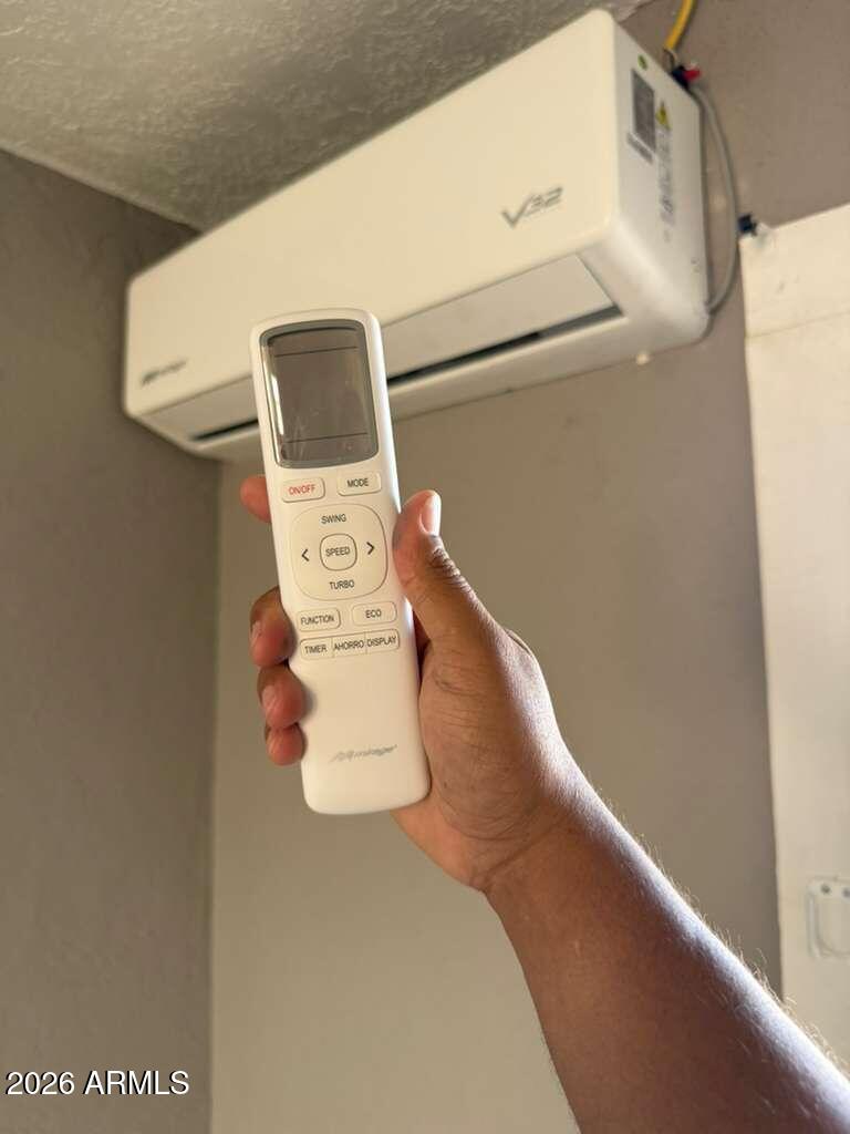 1165 East 10th Street, Unit 3 Douglas, AZ 85607 - Photo 22 of 22 a utility room with dryer and washer