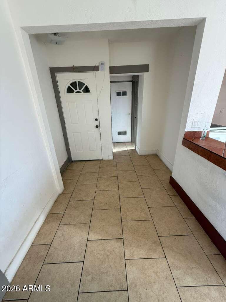 1165 East 10th Street, Unit 3 Douglas, AZ 85607 - Photo 4 of 22 a view of a utility room with a sink