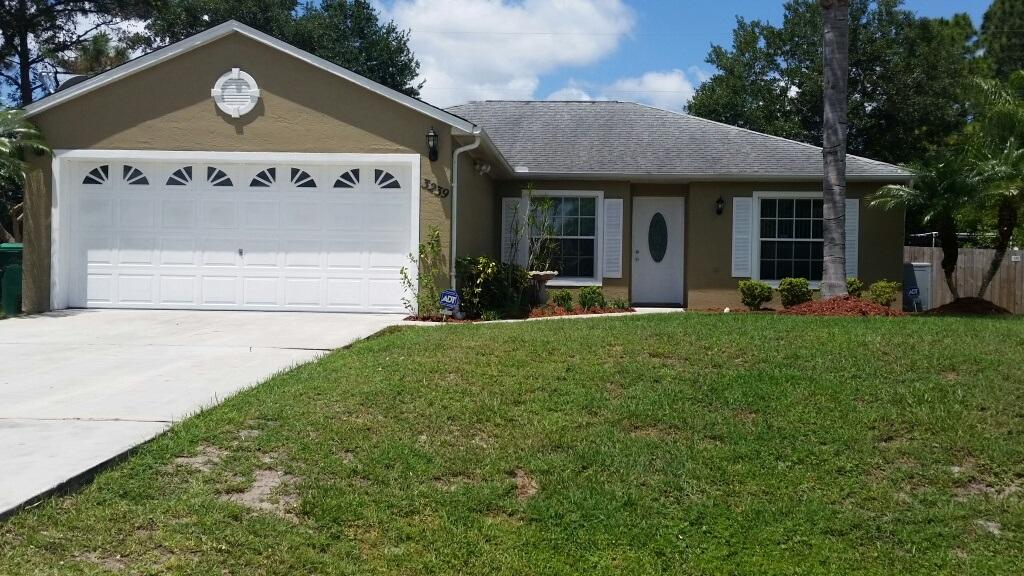 3239 Southeast W Snow Road Port St. Lucie, FL 34984 - Photo 1 of 24 Front of Home