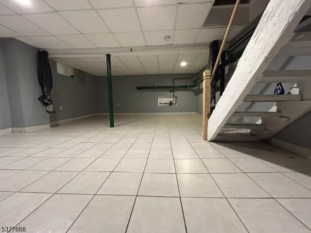 a view of a yard with plants and a houses