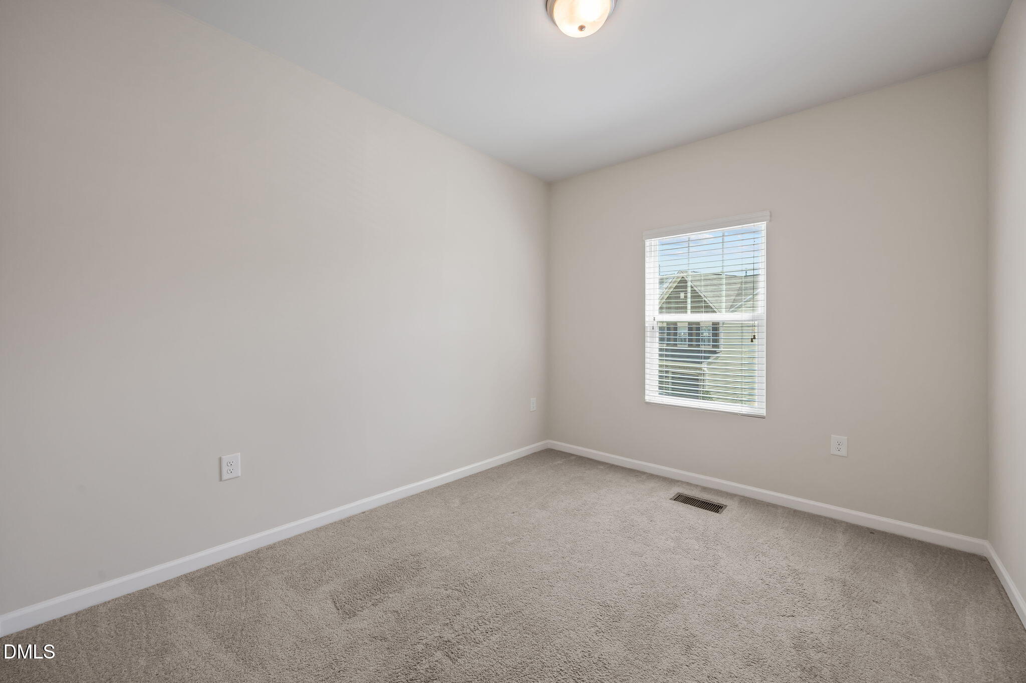 1005 Epiphany Road Morrisville, NC 27560 - Photo 16 of 23 an empty room with a window