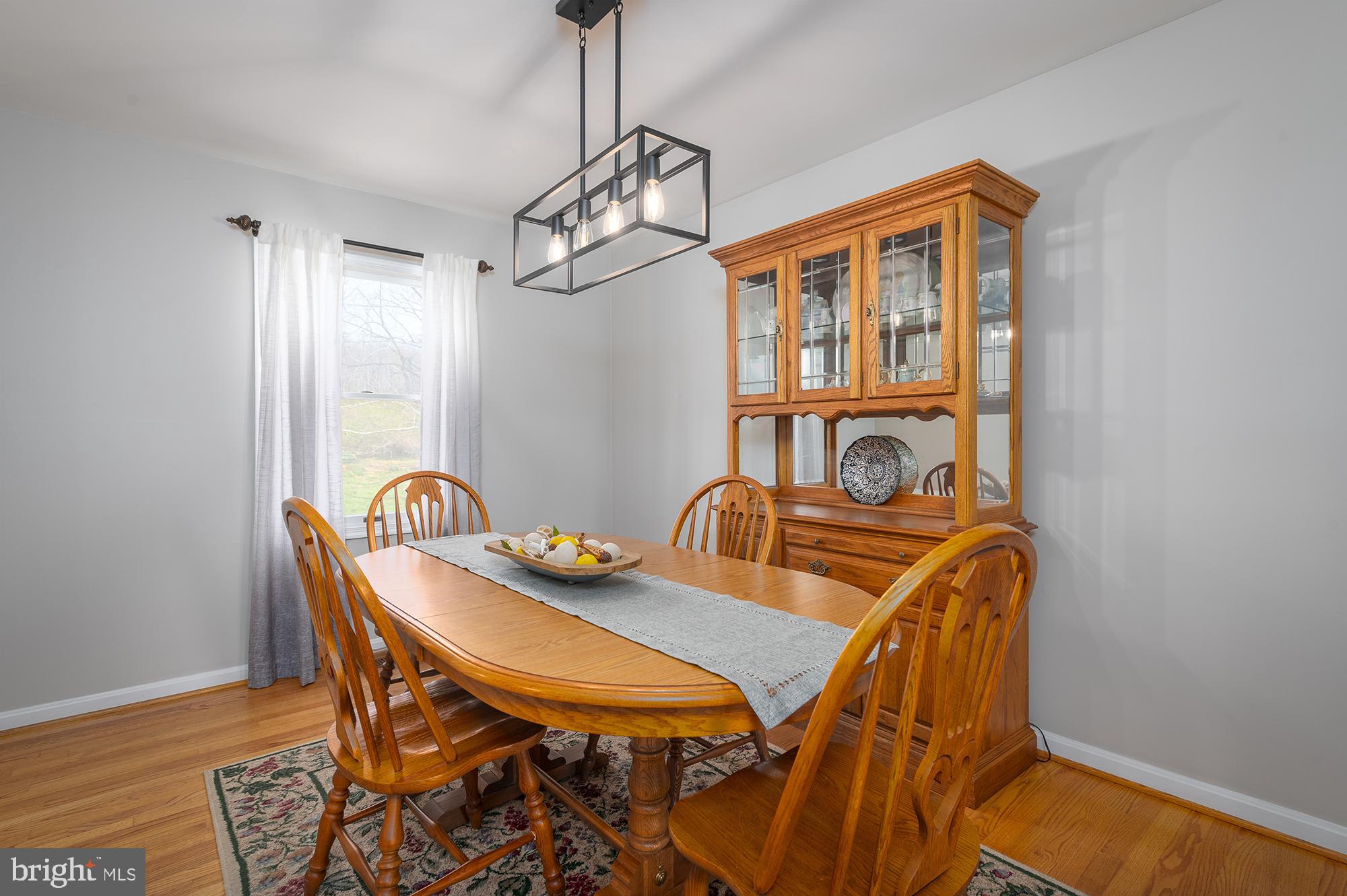 318 Regal Drive Abingdon, MD 21009 - Photo 3 of 43 Formal dining room with hardwoods