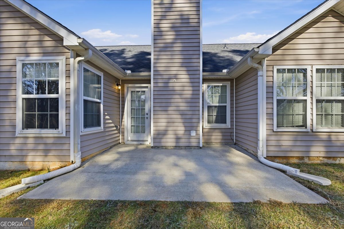 946 Damson Trail Hampton, GA 30228 - Photo 33 of 37 a view of a house with a porch