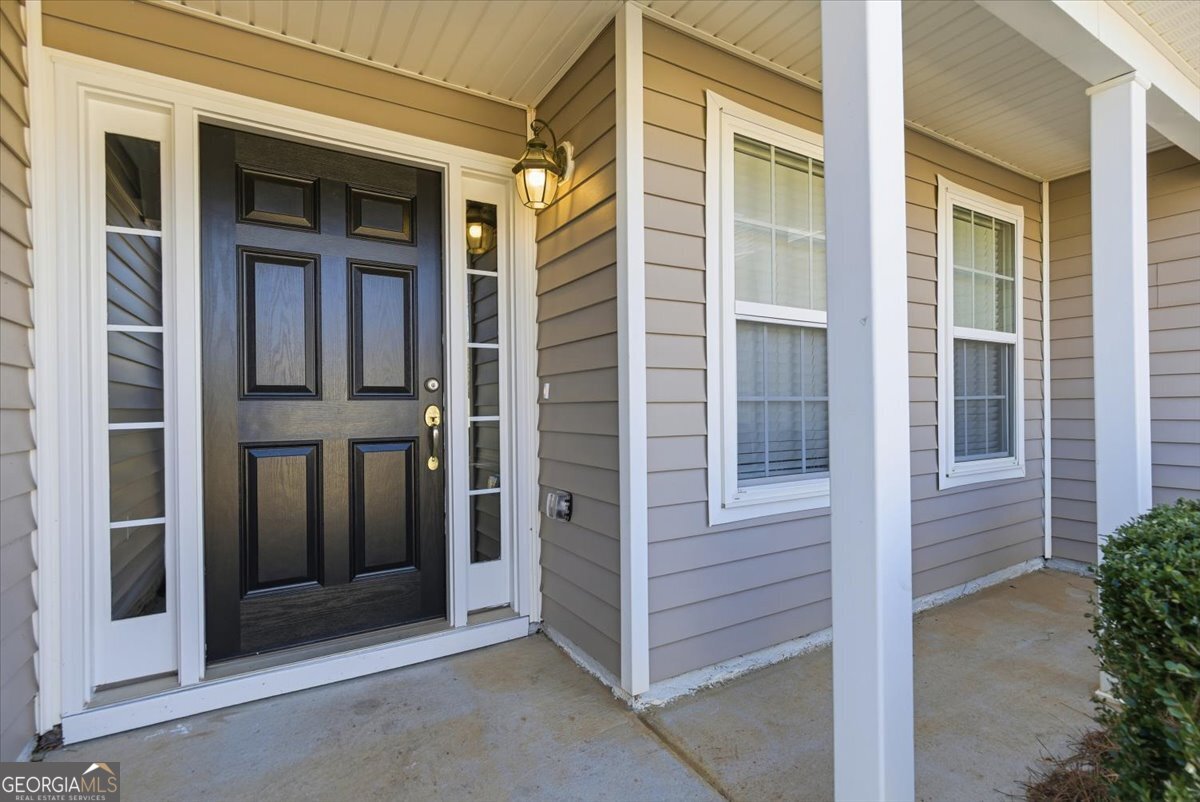 946 Damson Trail Hampton, GA 30228 - Photo 4 of 37 front view of a brick house