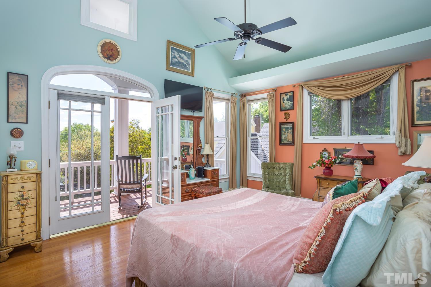 601 Leonidas Court Raleigh, NC 27604 - Photo 12 of 53 a bedroom with a bed and a large window