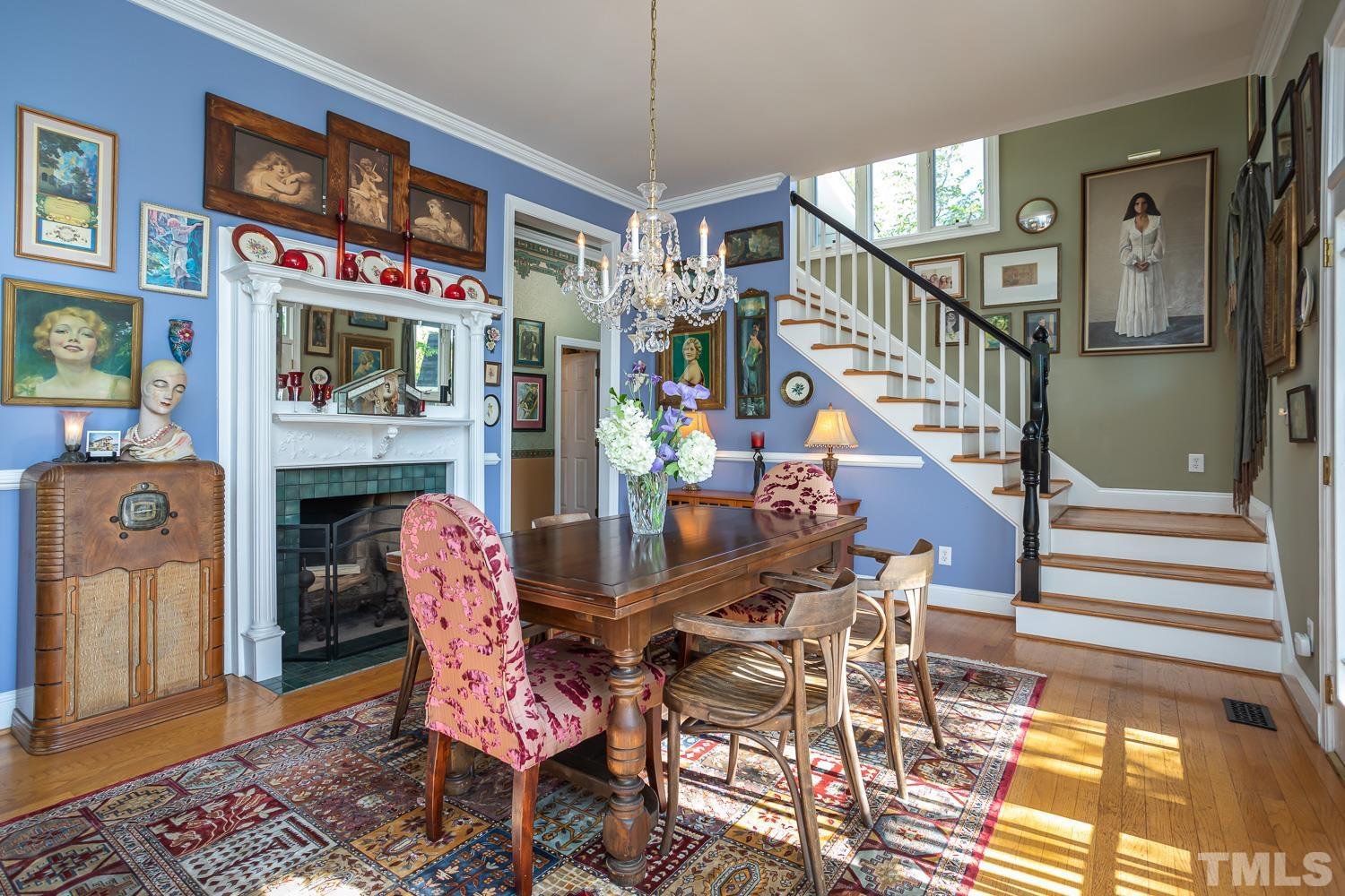 601 Leonidas Court Raleigh, NC 27604 - Photo 16 of 53 a dining room with furniture entryway and wooden floor