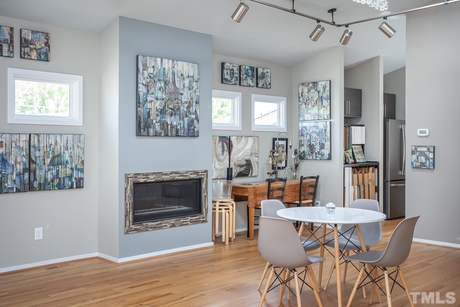 601 Leonidas Court Raleigh, NC 27604 - Photo 23 of 53 a view of a dining room with furniture window and wooden floor