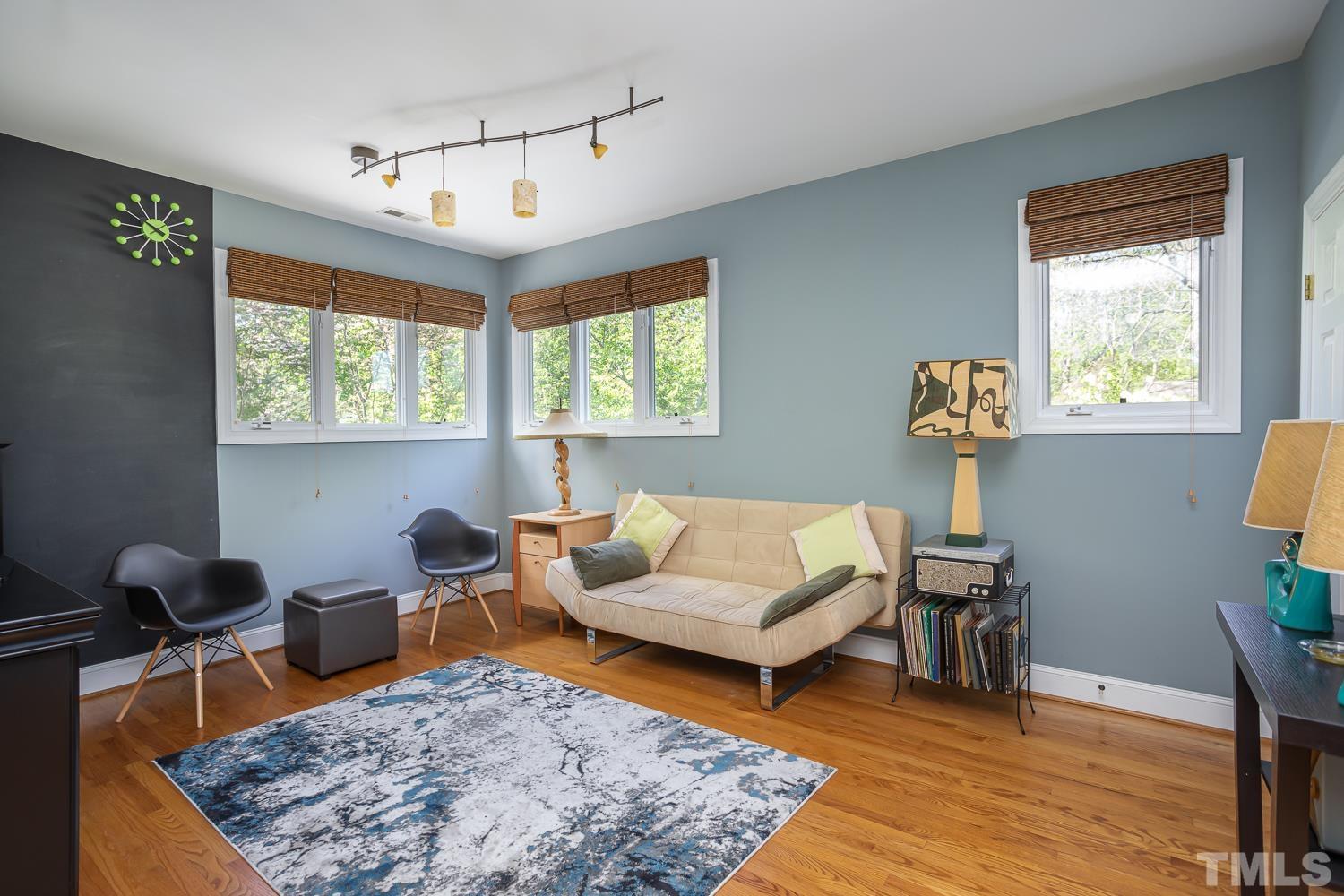 601 Leonidas Court Raleigh, NC 27604 - Photo 25 of 53 a living room with furniture rug and window