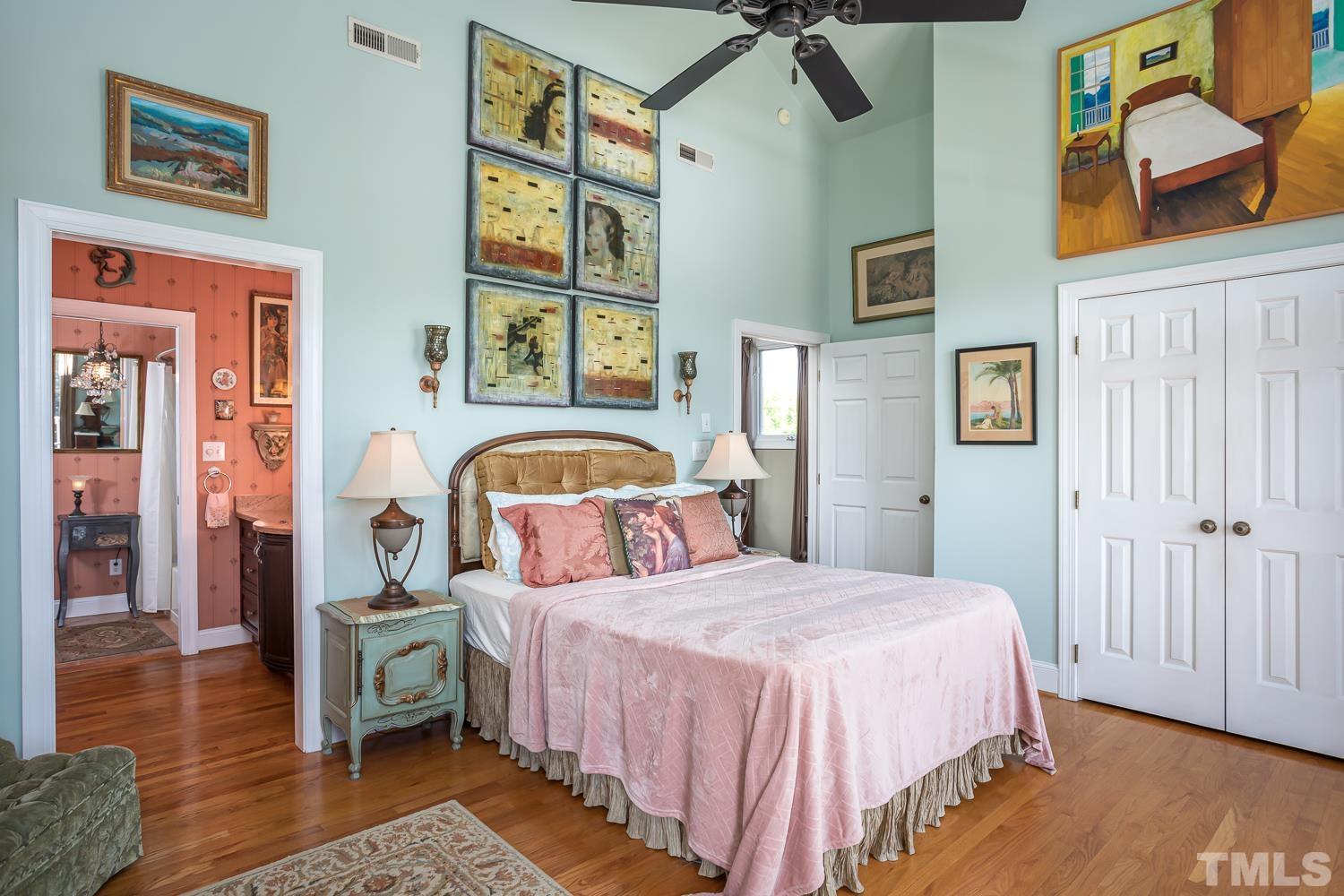 601 Leonidas Court Raleigh, NC 27604 - Photo 3 of 53 a bedroom with bed and wooden floor