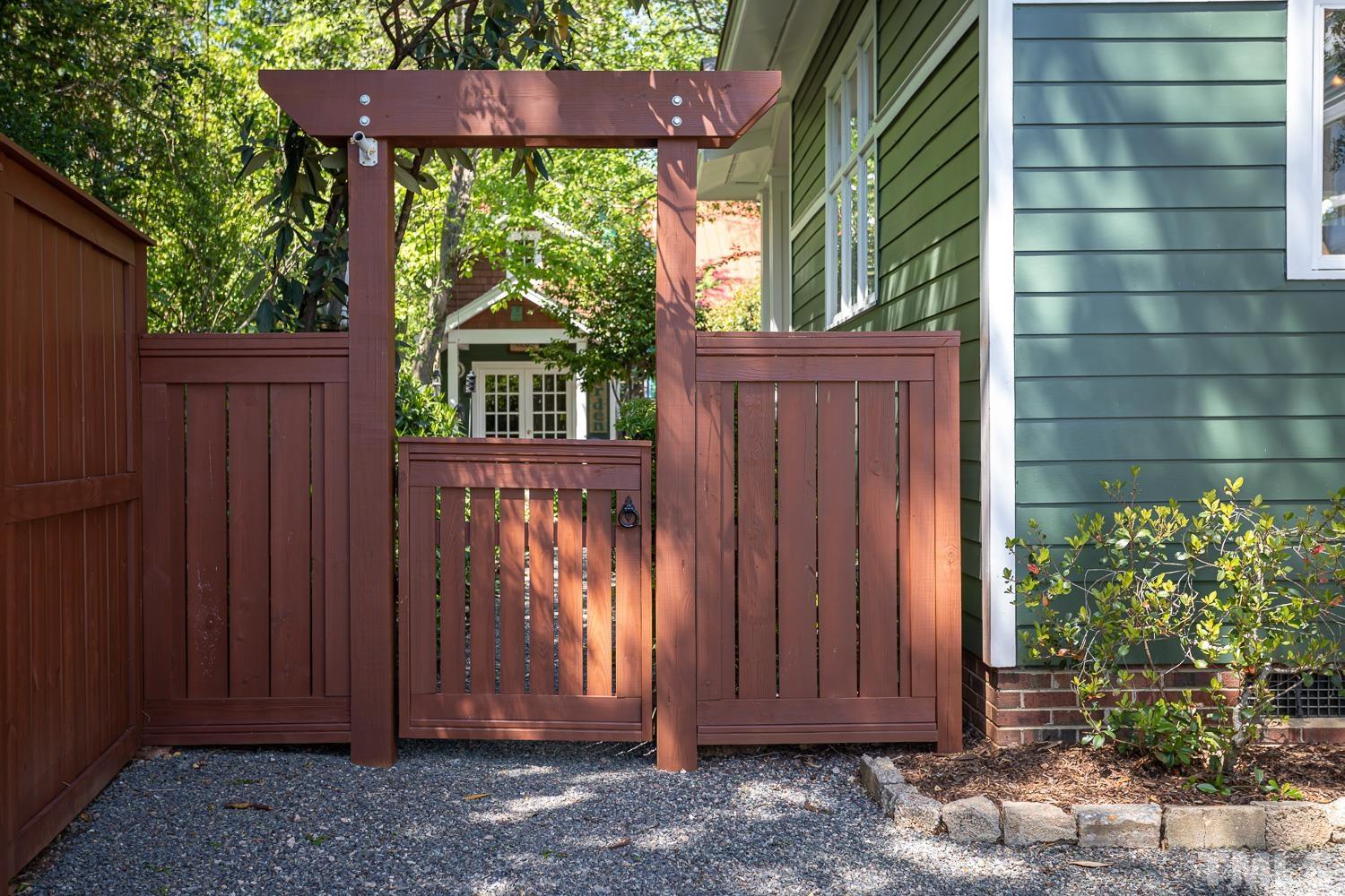 601 Leonidas Court Raleigh, NC 27604 - Photo 46 of 53 a view of outdoor space with sliding door and wooden fence