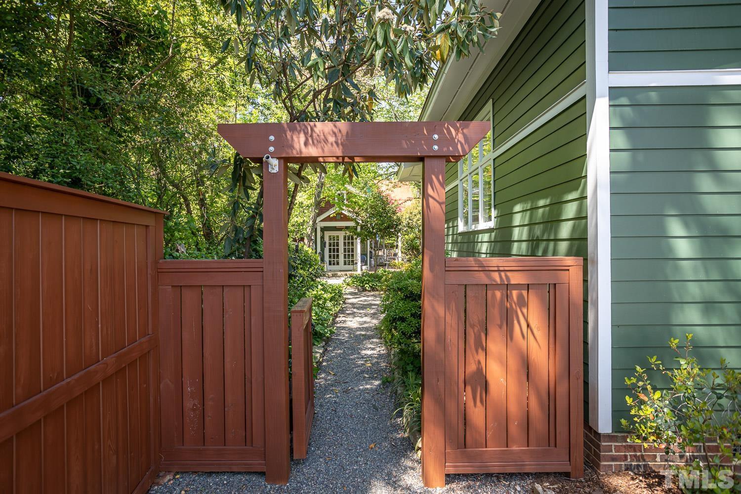 601 Leonidas Court Raleigh, NC 27604 - Photo 47 of 53 a view of a house with a door and wooden floor