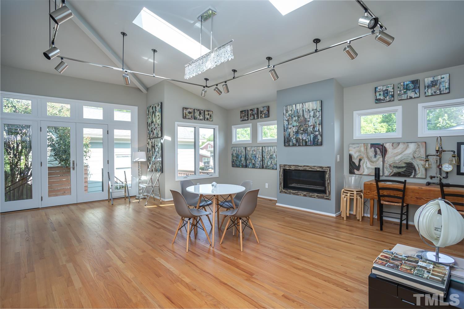 601 Leonidas Court Raleigh, NC 27604 - Photo 5 of 53 a view of a livingroom with furniture window and wooden floor
