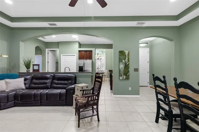 a bathroom with double vanity sinks and a mirror