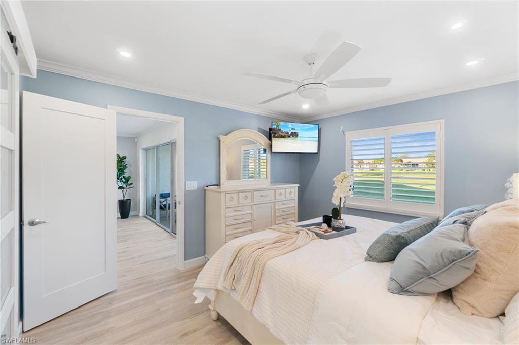 5975 Bloomfield Circle, Unit C108 Naples, FL 34112 - Photo 26 of 50 Primary bedroom view out to the golf course
