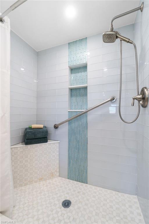 5975 Bloomfield Circle, Unit C108 Naples, FL 34112 - Photo 28 of 50 Bathroom featuring walk in shower
