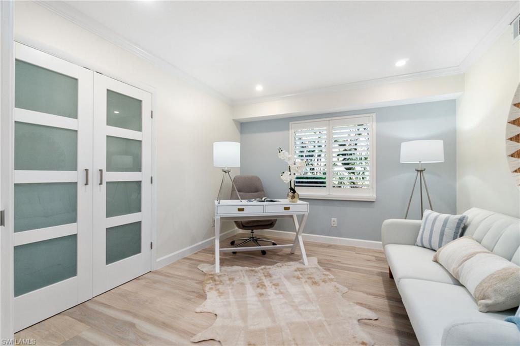 5975 Bloomfield Circle, Unit C108 Naples, FL 34112 - Photo 32 of 50 Versatile room with single panel doors