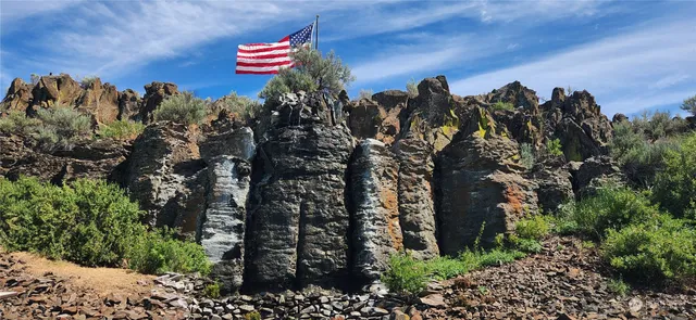 a view of street with parked cars